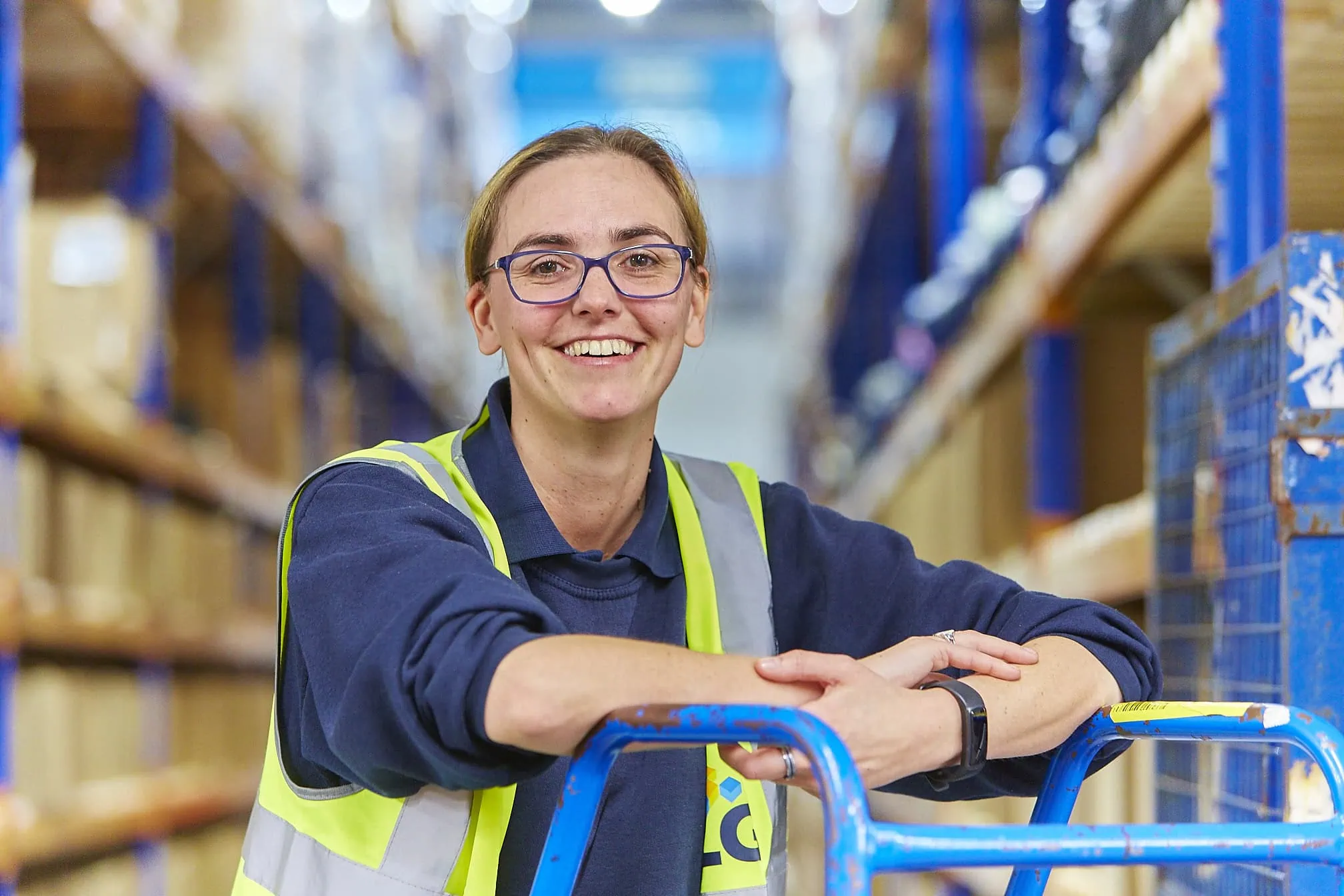 ILG woman smiling in warehouse