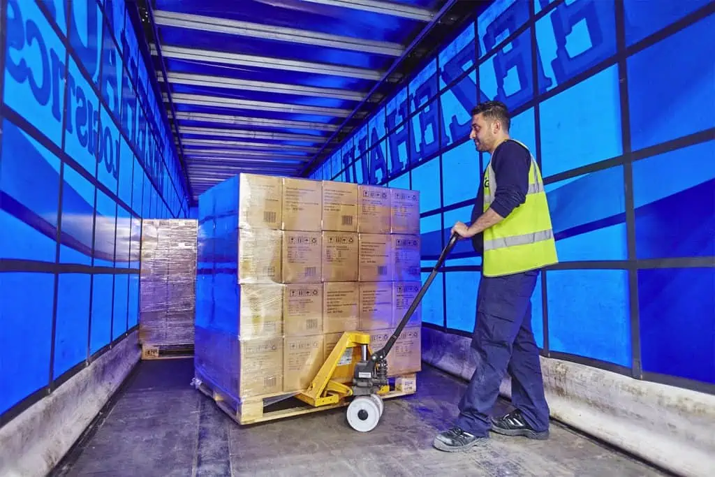 man-unloading-lorry