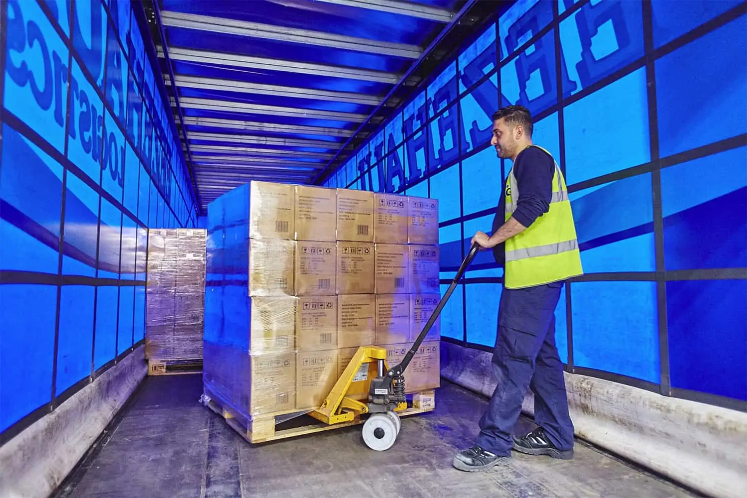 man-unloading-lorry