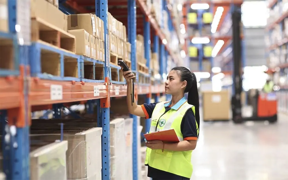 women-scanning-boxes-in-warehouse