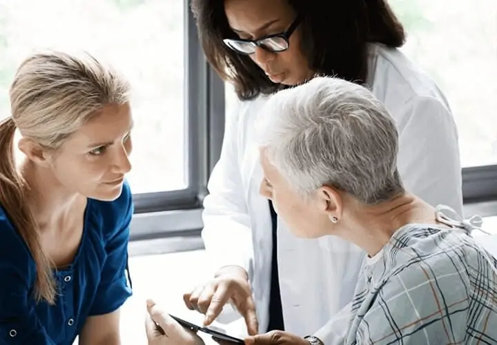 Doctor having a discussion with patients