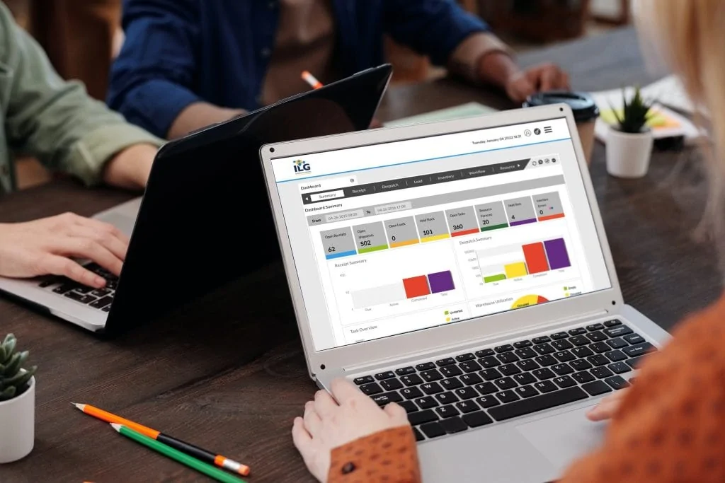 ILG analytics dashboard displayed on an office laptop