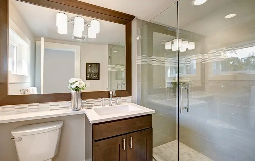 A luxury bathroom sink and shower suite