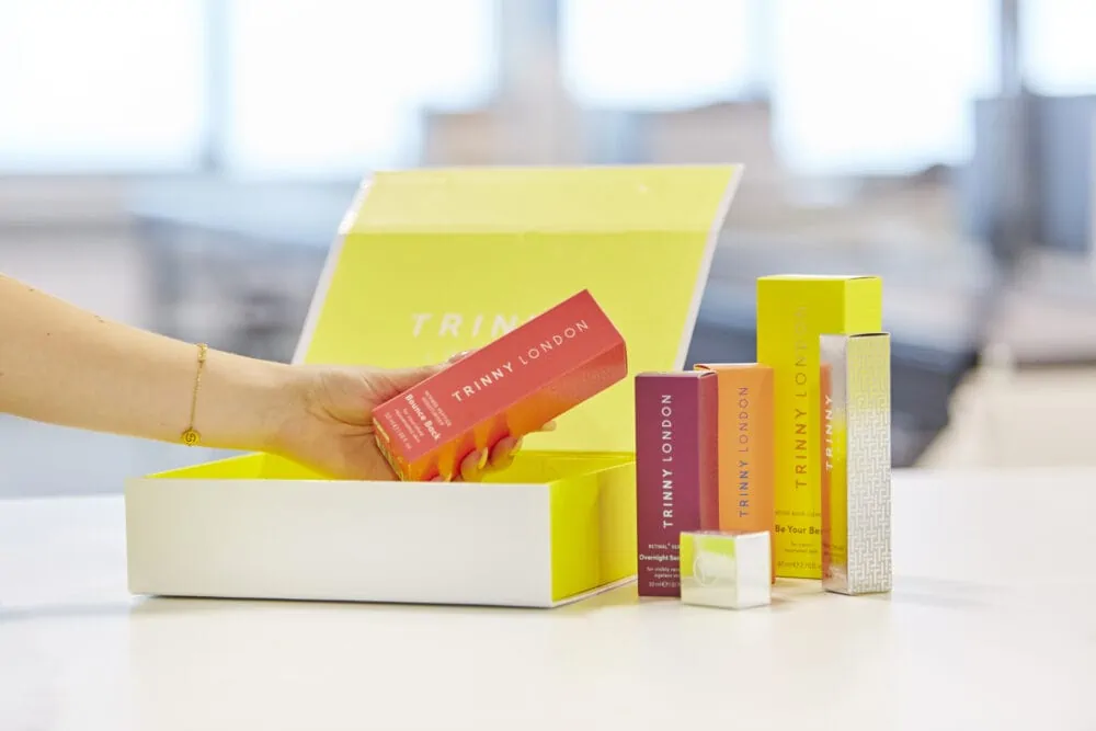 Trinny London cosmetics being packed into a box