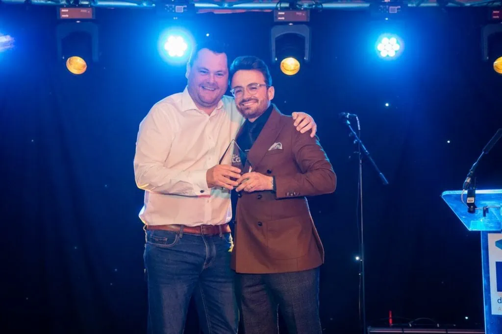 Ryan Ellis collecting award on stage