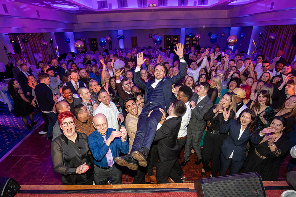 Tom Ashley crowd surfing at ILG Awards party