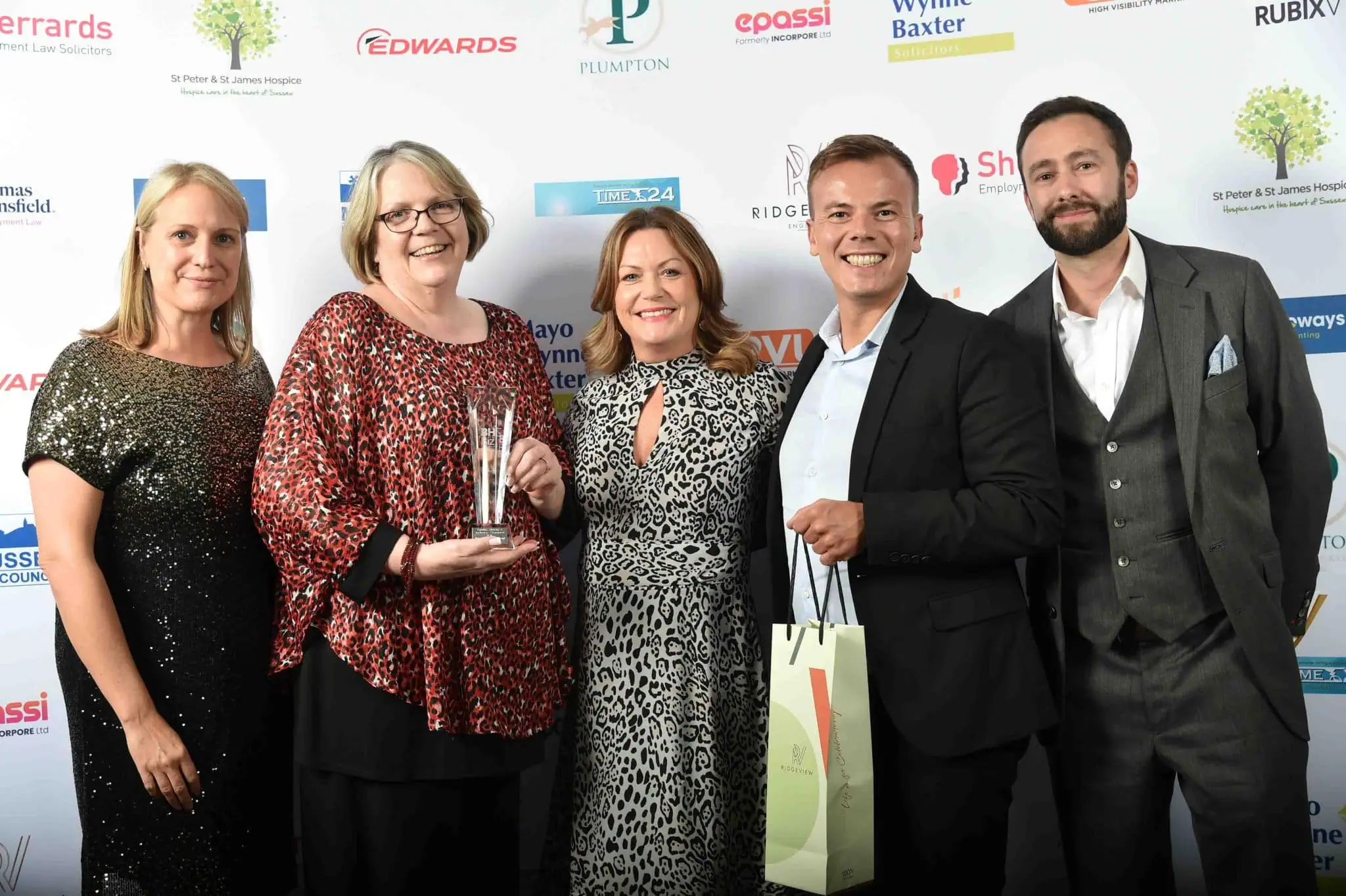 ILG team accepting award at Burgess Hill Business Awards 2024