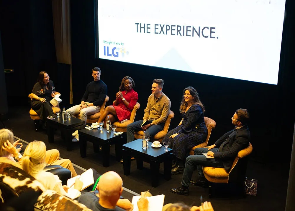 Panel on stage at beauty vibe event