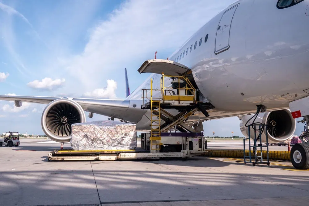 cargo being loaded into an airplane